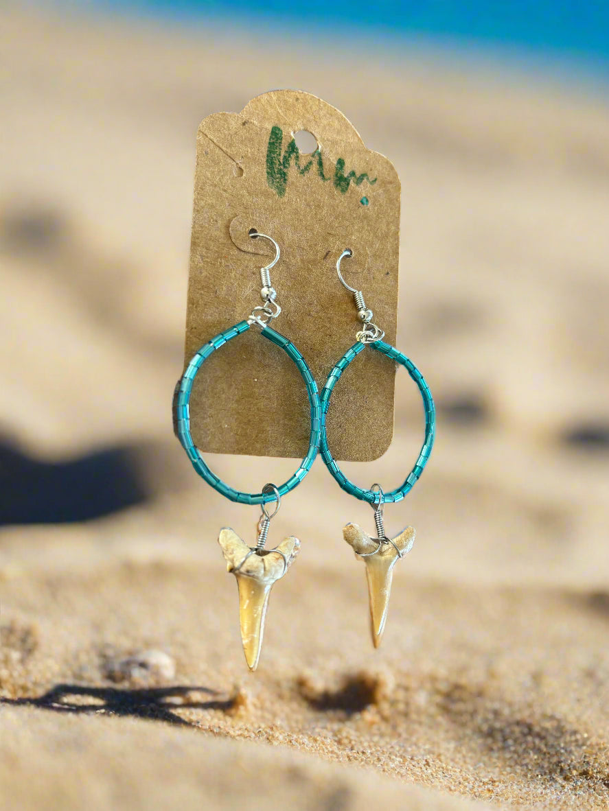 blue beaded earrings with small shark teeth