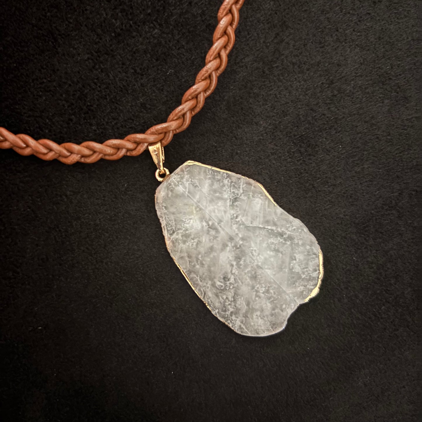 braided brown leather necklace with agate pendant