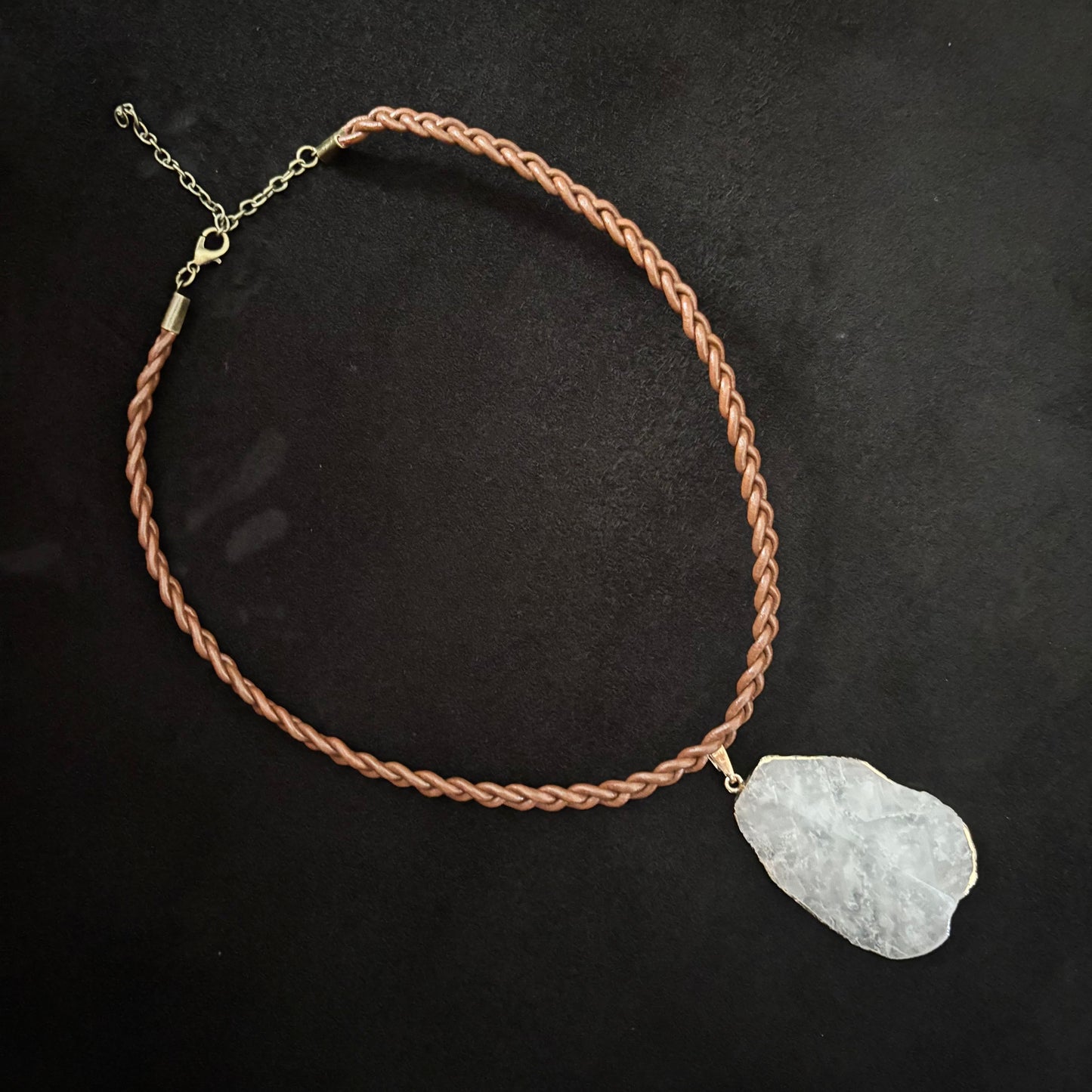 braided brown leather necklace with agate pendant