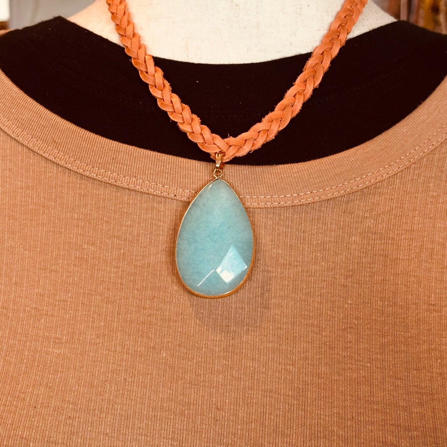 burnt orange leather necklace with beautiful blue teardrop gemstone pendant