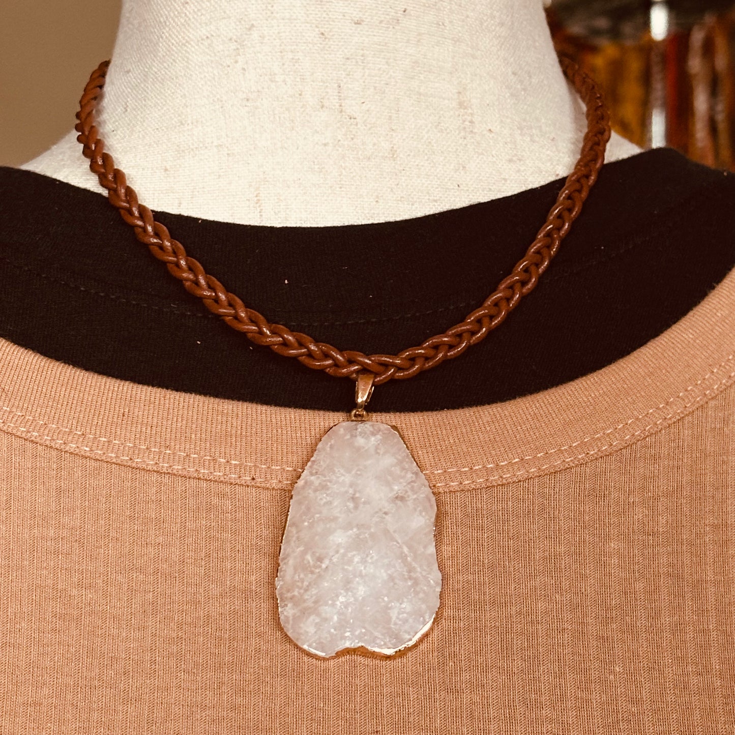 braided brown leather necklace with agate pendant