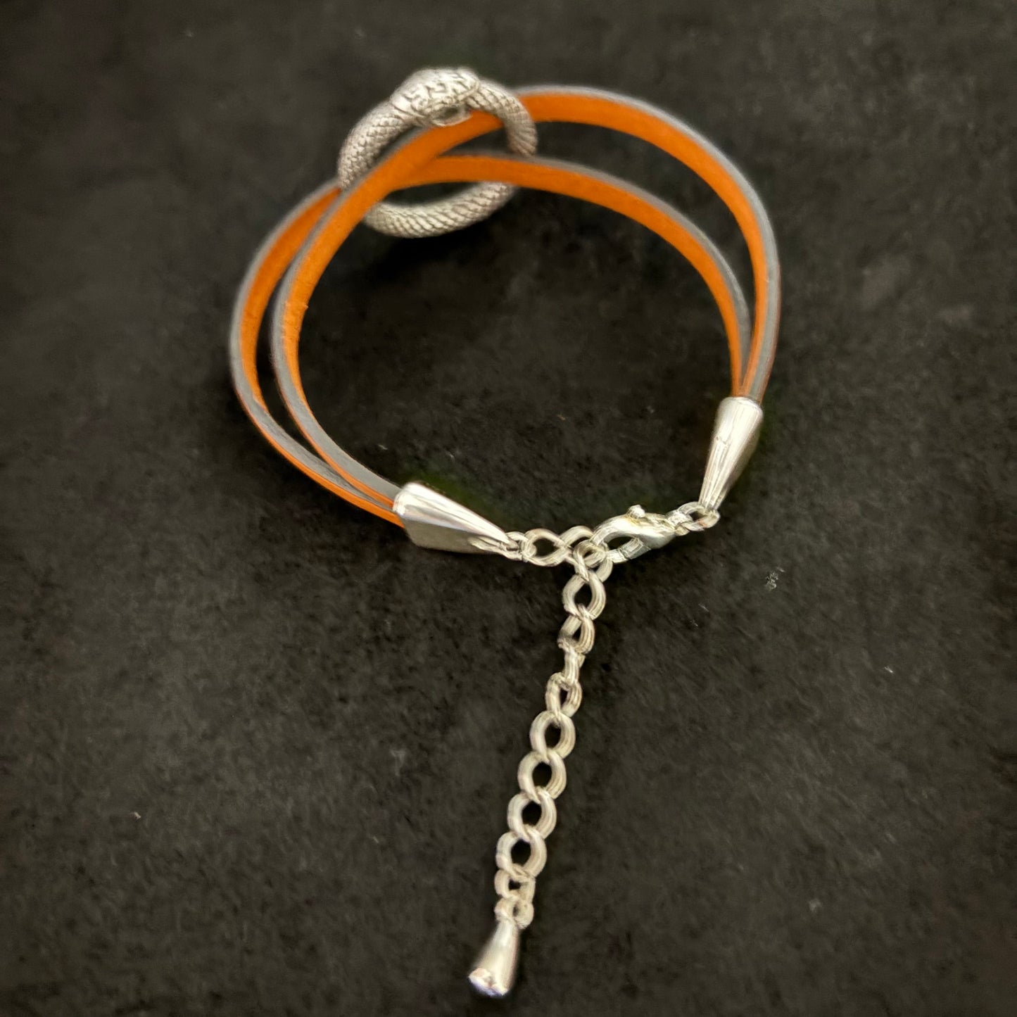 leather bracelet with ouroboros